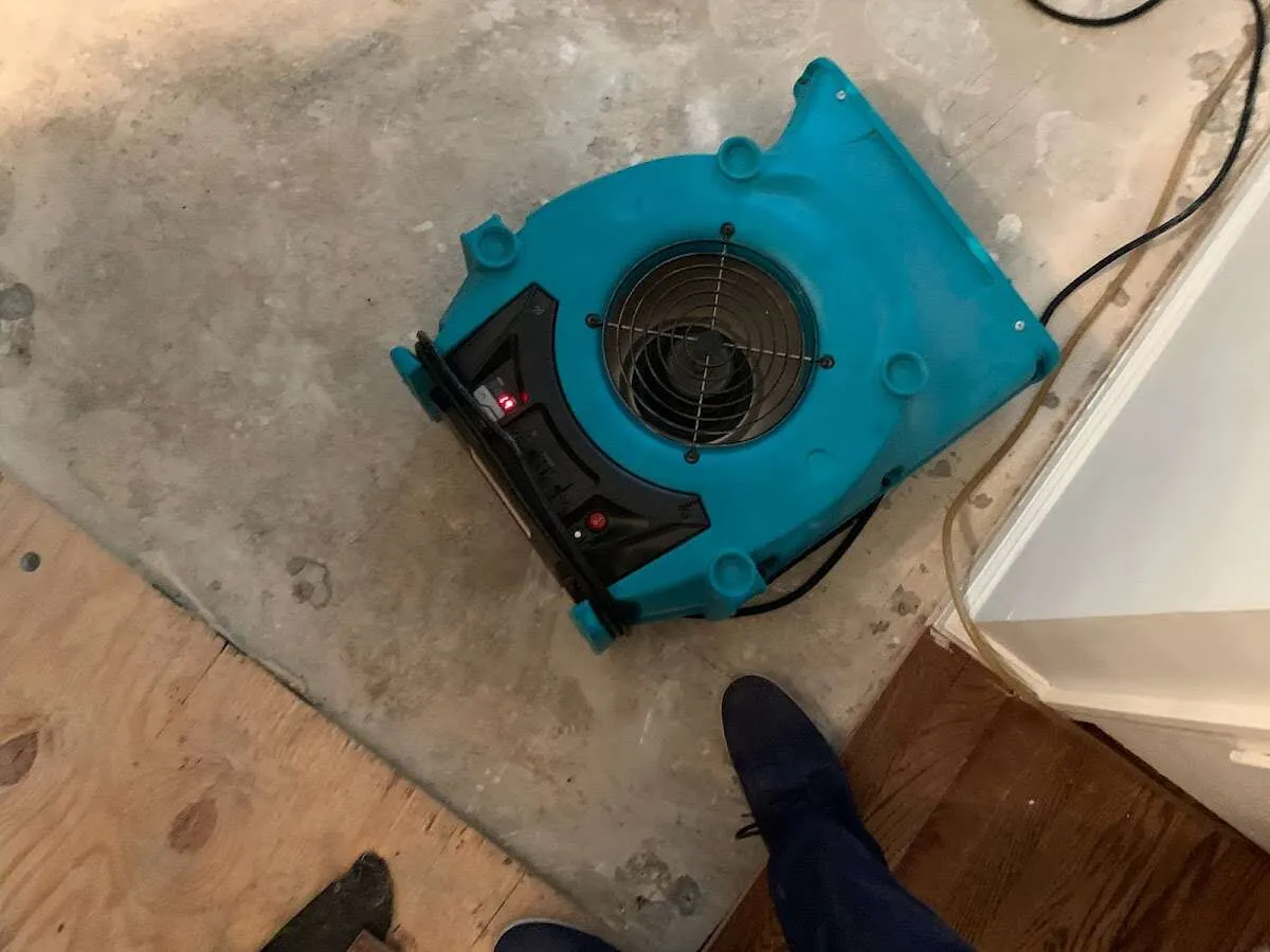 Air mover drying subfloor during Leak Detection & Repair in South El Monte